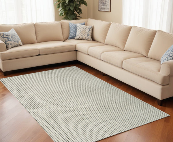 Homeroots 5' X 8' Beige And Black Checkered Power Loom Distressed Area Rug  Polyester 534409