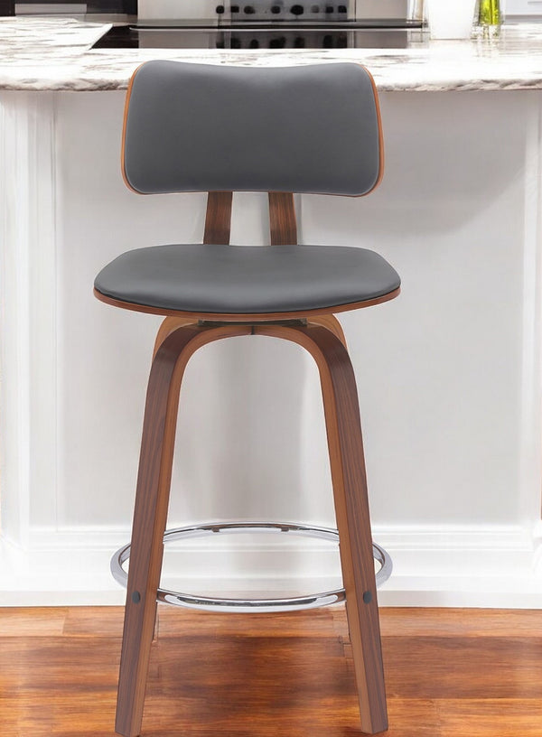 Homeroots 26" Gray And Wood Brown Faux Leather Swivel Low Back Counter Height Bar Chair   534430