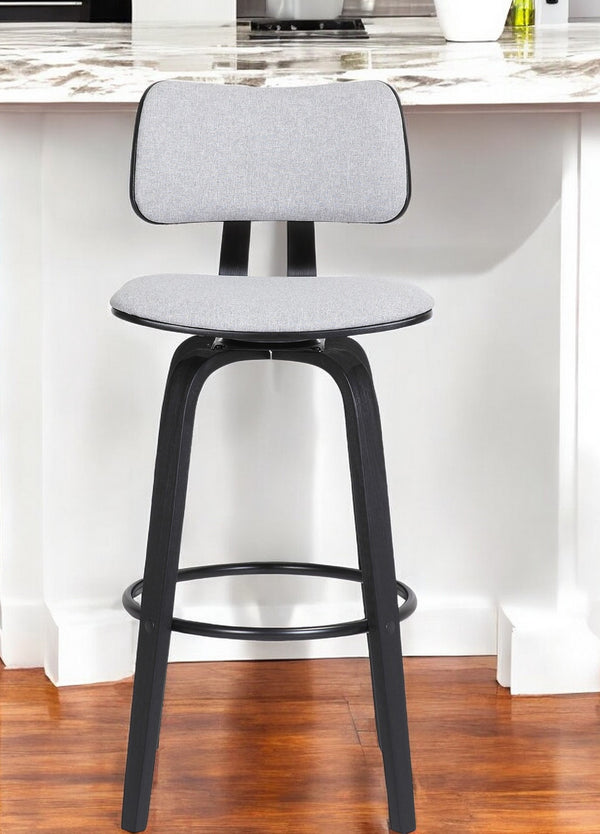 Homeroots 26" Light Gray And Black Fabric Swivel Low Back Counter Height Bar Chair   534434
