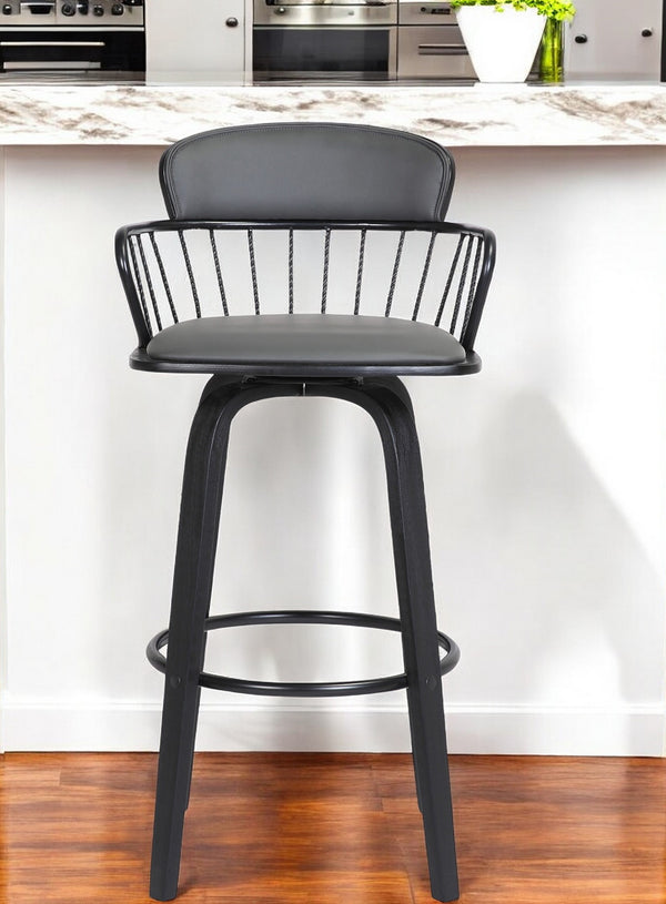 Homeroots 26" Gray And Black Faux Leather Swivel Low Back Counter Height Bar Chair   534440