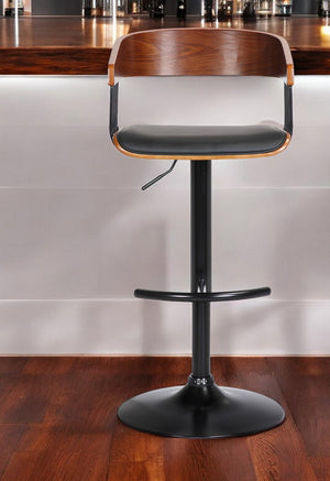 Homeroots Black Faux Leather And Metal Swivel Adjustable Height Bar Chair   534462