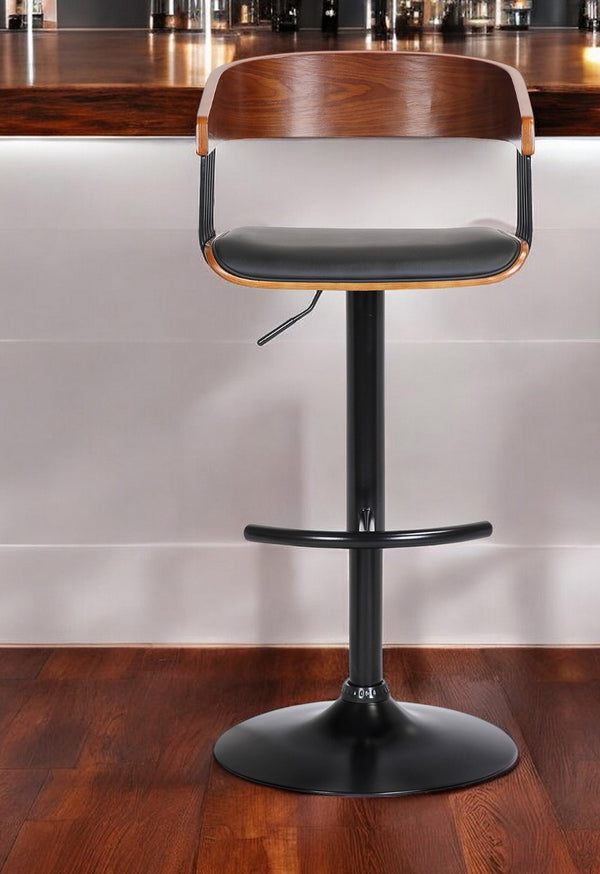 Homeroots Black Faux Leather And Metal Swivel Adjustable Height Bar Chair   534462