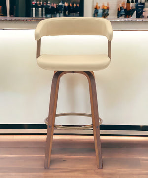 Homeroots 31" Cream And Wood Brown Faux Leather Swivel Bar Height Bar Chair   534469