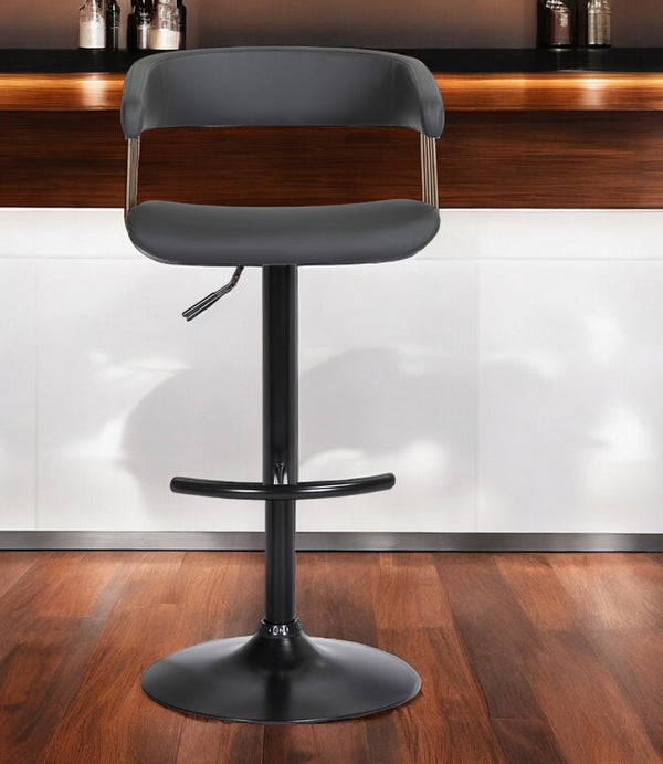 Homeroots Black Faux Leather And Metal Swivel Adjustable Height Bar Chair   534477