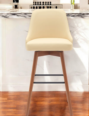 Homeroots 30" Cream And Wood Brown Faux Leather With Solid Wood Swivel Bar Height Bar Chair   534484