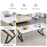 English Elm A Coffee Table Made Of Rock Slab Material, With A Smooth and Natural Surface That Complements The Modern Design Of The Black Metal Legs, Making It Suitable For Living Rooms Of All Sizes.47*23.6