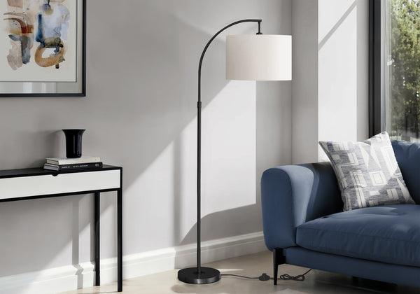 English Elm Lighting, 65"H arc floor lamp with ivory drum shade, sleek metal frame, 100W max, foot switch, modern ambiance Black 26 L x 17 W x 16 H B2710P221307