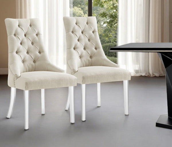 HomeRoots Set of Two Elegant Tufted Cream Linen Dining Chairs with Clear Legs for Modern Interiors 543513