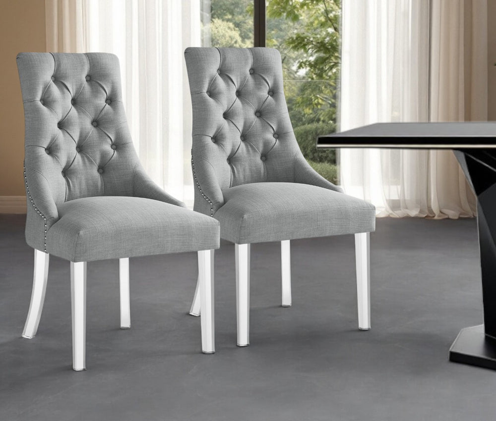 HomeRoots Set of Two Elegant Tufted Light Gray Upholstered Side Chairs with Clear Legs for Versatile Use 543514
