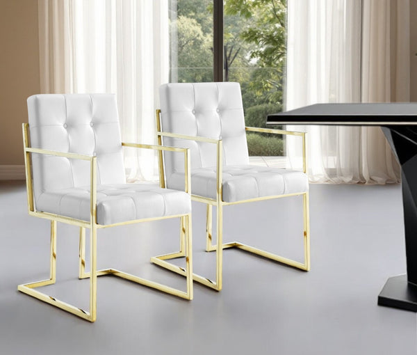 HomeRoots Set of Two Elegant Tufted White & Gold Faux Leather Dining Armchairs for Stylish Comfort 543516