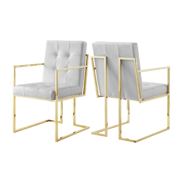 HomeRoots Set of Two Elegant Tufted White & Gold Faux Leather Dining Armchairs for Stylish Comfort 543516
