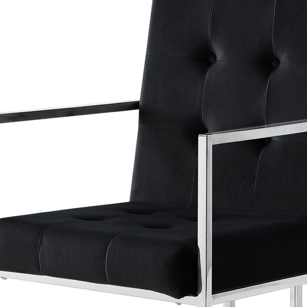HomeRoots Set of Two Elegant Tufted Black Velvet Dining Arm Chairs with Silver Legs for Modern Spaces 543517