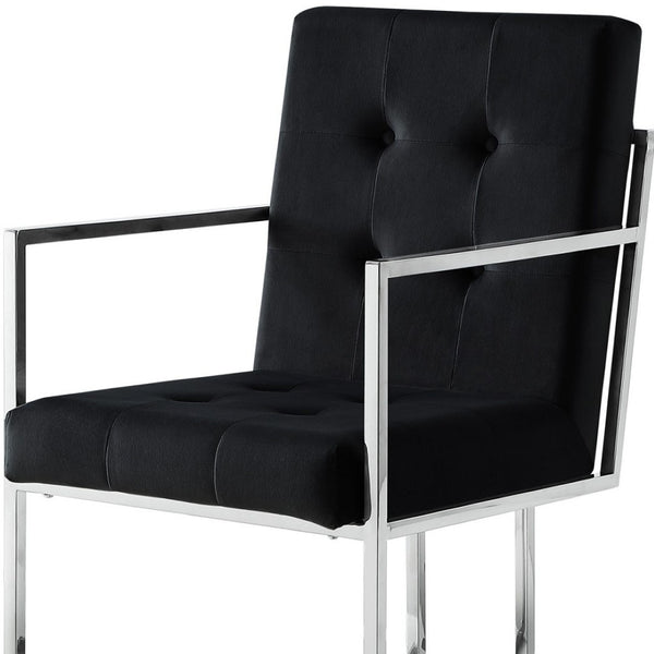 HomeRoots Set of Two Elegant Tufted Black Velvet Dining Arm Chairs with Silver Legs for Modern Spaces 543517