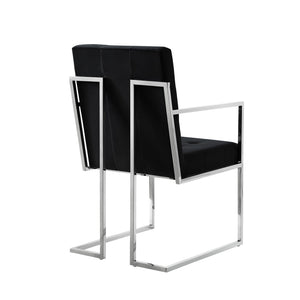 HomeRoots Set of Two Elegant Tufted Black Velvet Dining Arm Chairs with Silver Legs for Modern Spaces 543517