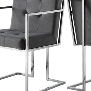 HomeRoots Set of Two Elegant Tufted Gray Velvet Arm Chairs with Silver Metallic Legs for Modern Dining Spaces 543518