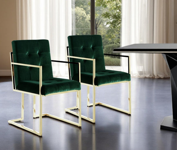 HomeRoots Set of Two Elegant Hunter Green Velvet Dining Arm Chairs with Gold Legs for Timeless Style 543519