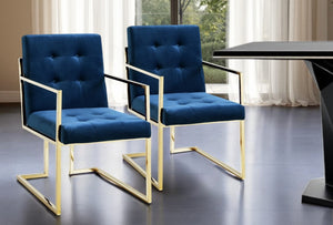 HomeRoots Set of Two Elegant Navy Blue Velvet Dining Armchairs with Gold Steel Legs for Timeless Comfort 543520