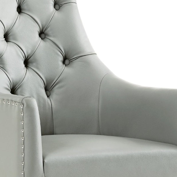 HomeRoots Set of Two Elegant Tufted Gray Faux Leather Dining Arm Chairs with Clear Legs for Versatile Seating 543544