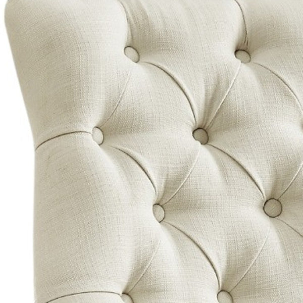 HomeRoots Set of Two Elegant Tufted Cream Linen Dining Arm Chairs with Clear Legs & Nailhead Trim Design 543547