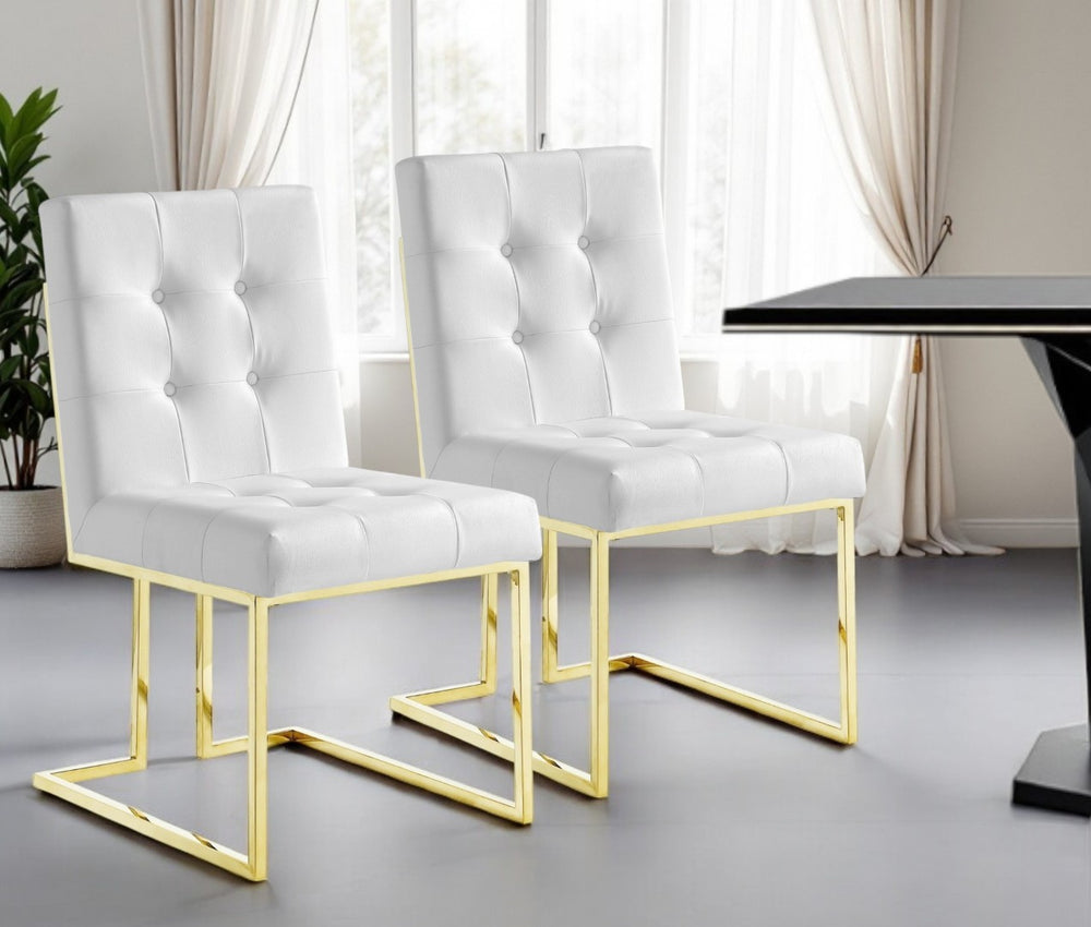 HomeRoots Set of Two Modern Glam Tufted White Faux Leather Dining Chairs with Gold Legs for Stylish Spaces 543550