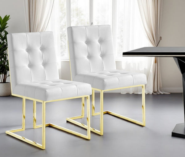 HomeRoots Set of Two Modern Glam Tufted White Faux Leather Dining Chairs with Gold Legs for Stylish Spaces 543550