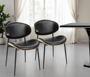 HomeRoots Set of Two Stylish Faux Leather and Wood Dining Chairs with Mid-Century Design for Versatile Use Black 543555