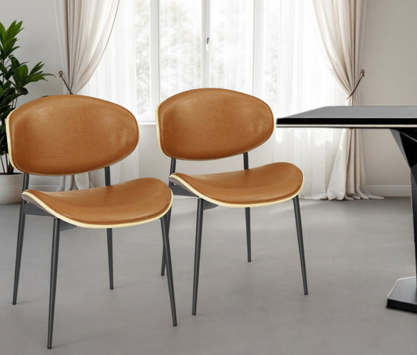 HomeRoots Set of Two Stylish Faux Leather and Wood Dining Chairs with Mid-Century Design for Versatile Use Brown 543558