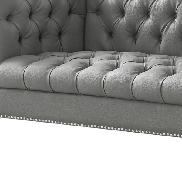 HomeRoots 85" Gray Faux Leather Sofa with Durable Frame, Tufted Design, and Stylish Nailhead Trim for Comfort 543962