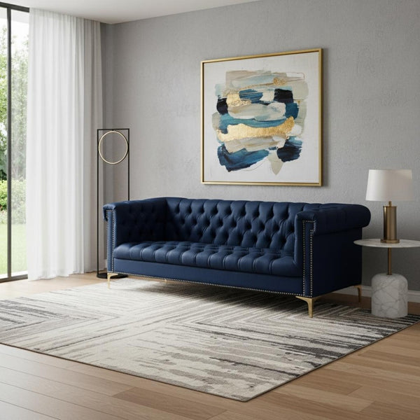 HomeRoots 85" Navy Blue Faux Leather Sofa with Modern Gold Legs, Tufted Design, and Durable Comfort for 3 543963