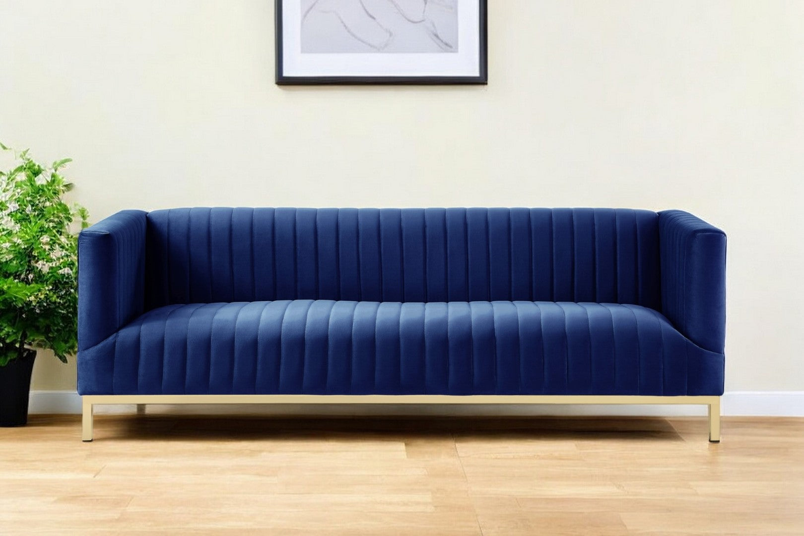 HomeRoots 85" Velvet Sofa for Modern Living Spaces - Plush Comfort, Stylish Silver Legs, and Timeless Elegance Navy/Gold 543974