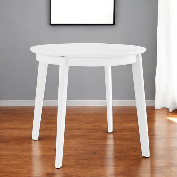 Homeroots 36" White Wood Round Top Dining Table - Stylish Centerpiece For Modern Homes, Seats 4 Comfortably!   544275