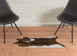 Homeroots 2' X 3' Brown And White Cowhide Hand Tufted Area Rug Purple Cowhide 544292