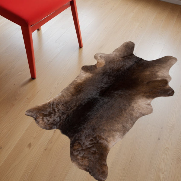 Homeroots 2' X 3' Brown Cowhide Hand Tufted Area Rug Teal Cowhide 544294