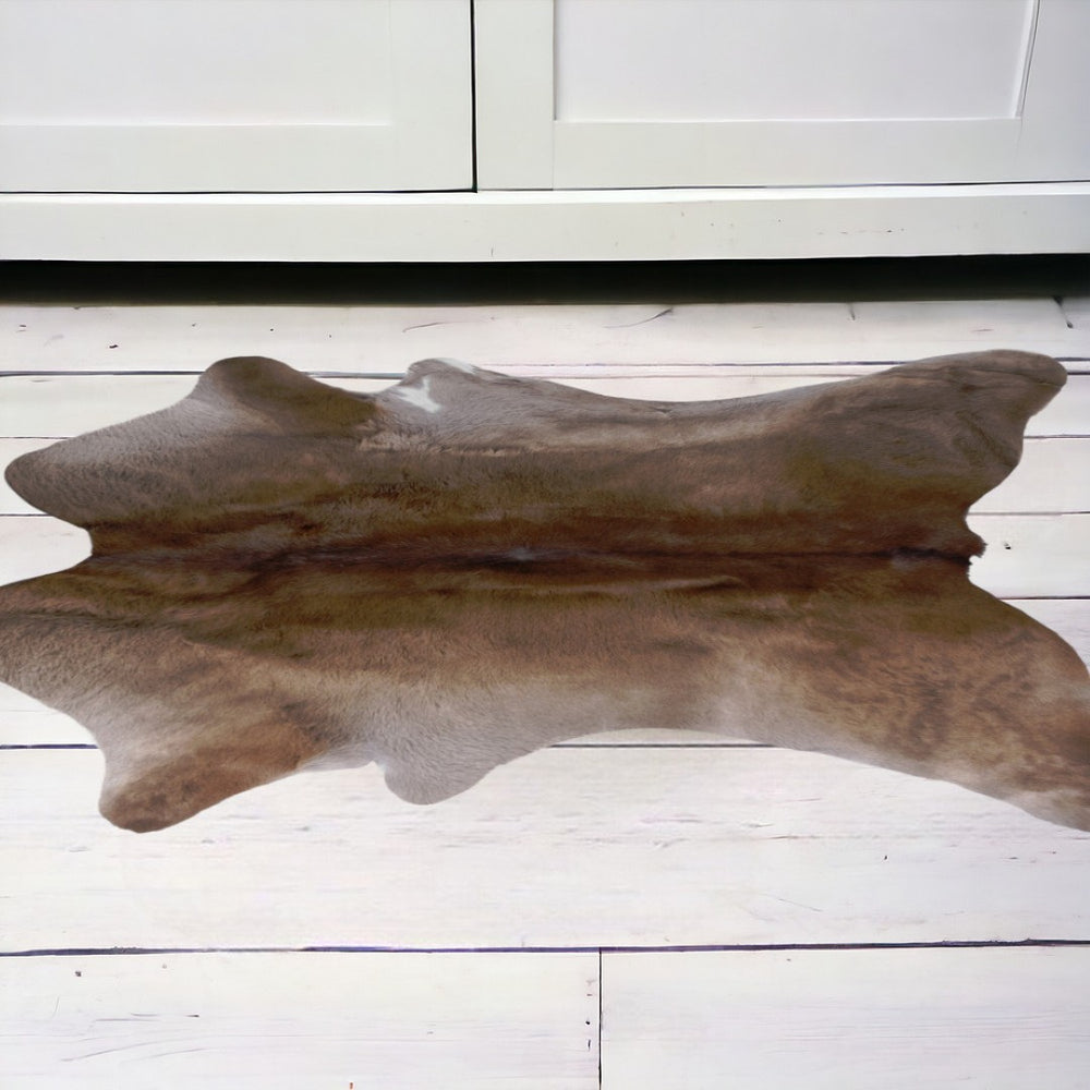 HomeRoots 2' X 3' Cowhide Hand-Tufted Area Rug - Rustic Charm, Stain Resistance, and Cozy Texture for Homes Brown 544297