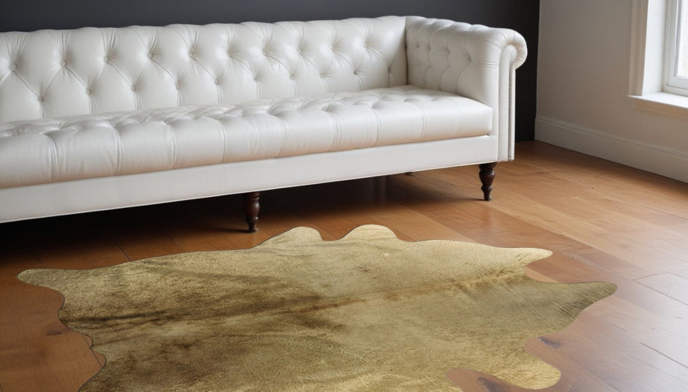 HomeRoots 6' Hand-Knotted Cowhide Area Rug – Bold Color, Unique Design & Stain-Resistant for Modern Homes Gold 544305