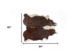 Homeroots 5' X 7' Brown And White Cowhide Handmade Area Rug White & Brown Cowhide 544314