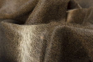 Homeroots 5' X 7' Dark Brown Cowhide Hand Knotted Area Rug Tan Cowhide 544319