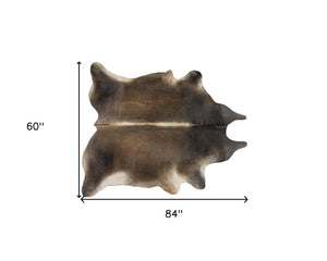 Homeroots 5' X 7' Dark Brown Cowhide Hand Knotted Area Rug Tan Cowhide 544319