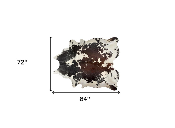 Homeroots 6' X 7' Brown Black And White Cowhide Hand Knotted Area Rug Beige And White Cowhide 544330
