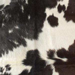 Homeroots 6' X 7' Brown Black And White Cowhide Hand Knotted Area Rug Beige And White Cowhide 544330