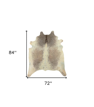 Homeroots 6' X 7' Brown And White Cowhide Hand Knotted Area Rug Tan And White Cowhide 544337