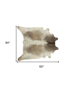 Homeroots 5' X 7' Brown And White Cowhide Hand Knotted Area Rug White & Brown Cowhide 544338