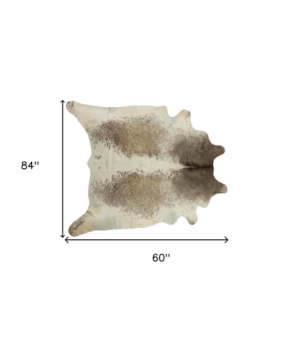 Homeroots 5' X 7' Brown And White Cowhide Hand Knotted Area Rug White & Brown Cowhide 544338