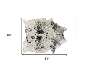 Homeroots 5' X 7' Black And White Cowhide Hand Knotted Area Rug Black And White Cowhide 544340