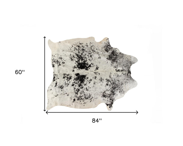 Homeroots 5' X 7' Black And White Cowhide Hand Knotted Area Rug Black And White Cowhide 544340