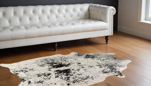 Homeroots 5' X 7' Black And White Cowhide Hand Knotted Area Rug Black And White Cowhide 544340