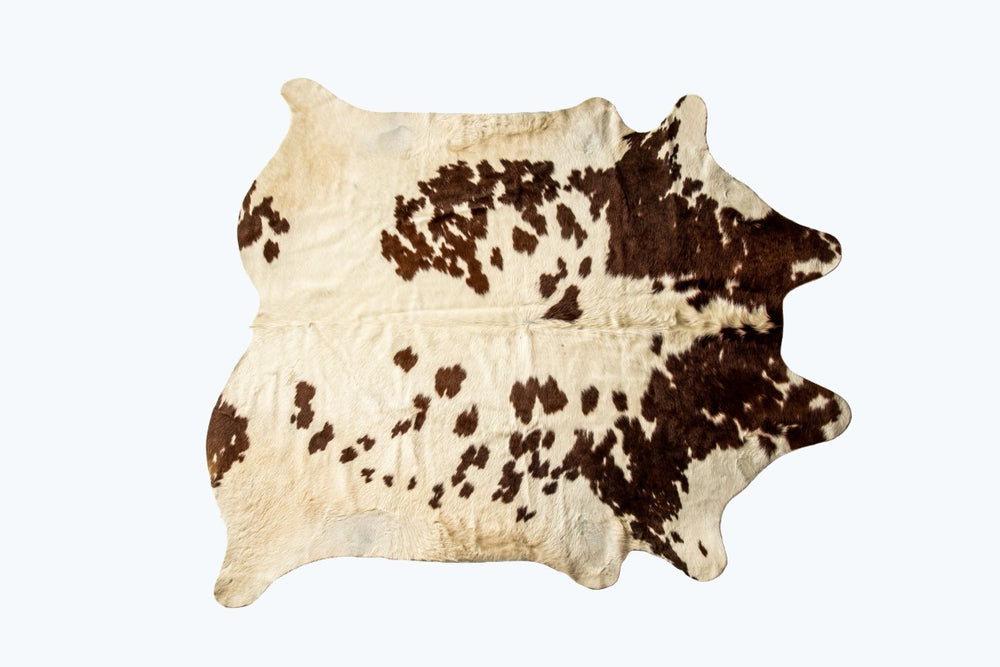 HomeRoots 5x7 Hand Knotted Cowhide Area Rug Artisan Crafted Rustic Accent for Any Room 544341