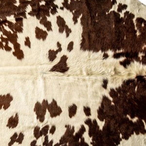 Homeroots 5' X 7' Brown And White Cowhide Hand Knotted Area Rug Brown And White Cowhide 544341