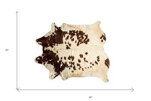 Homeroots 5' X 7' Brown And White Cowhide Hand Knotted Area Rug Brown And White Cowhide 544341