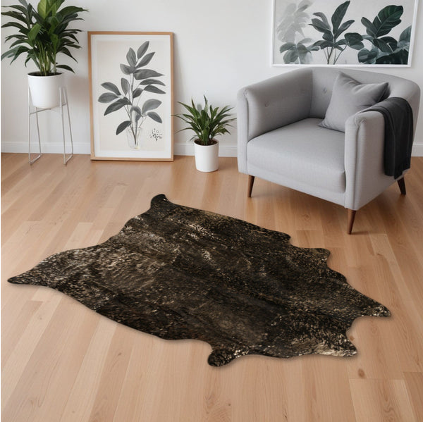Homeroots 5' X 7' Black And Copper Gold Cowhide Hand Knotted Area Rug Brown And Black Cowhide 544343